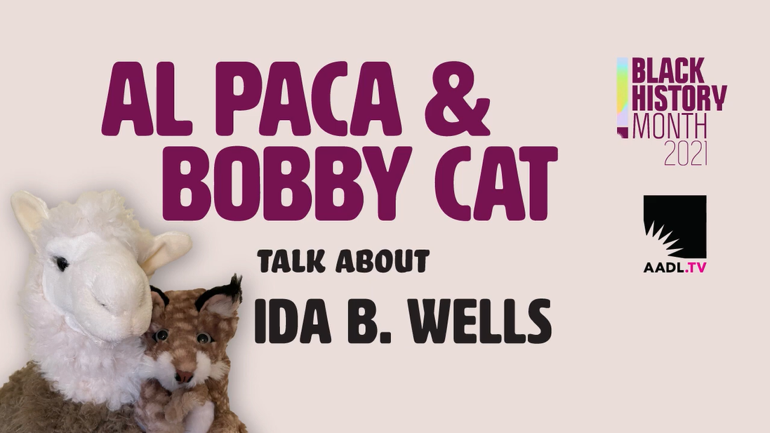 Alpaca puppet and cat puppet on orange background with text reading "Al Paca & Bobby Cat Talk About Ida B. Wells"