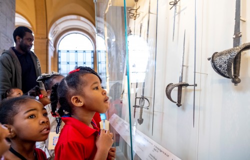 Kids looking at a display form the DIA