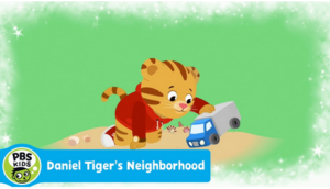 Daniel Tiger playing with a toy truck